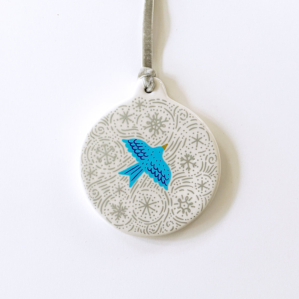 Circle Ornament - Bluebird Flying in Snow - Silver Velvet Ribbon